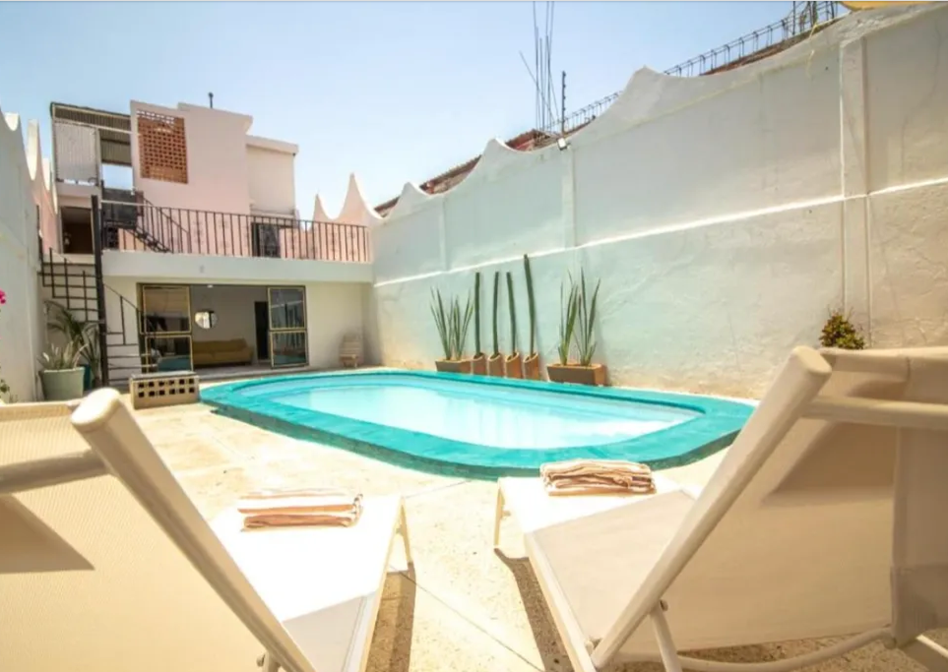 A private villa, shared by a small group of women.
